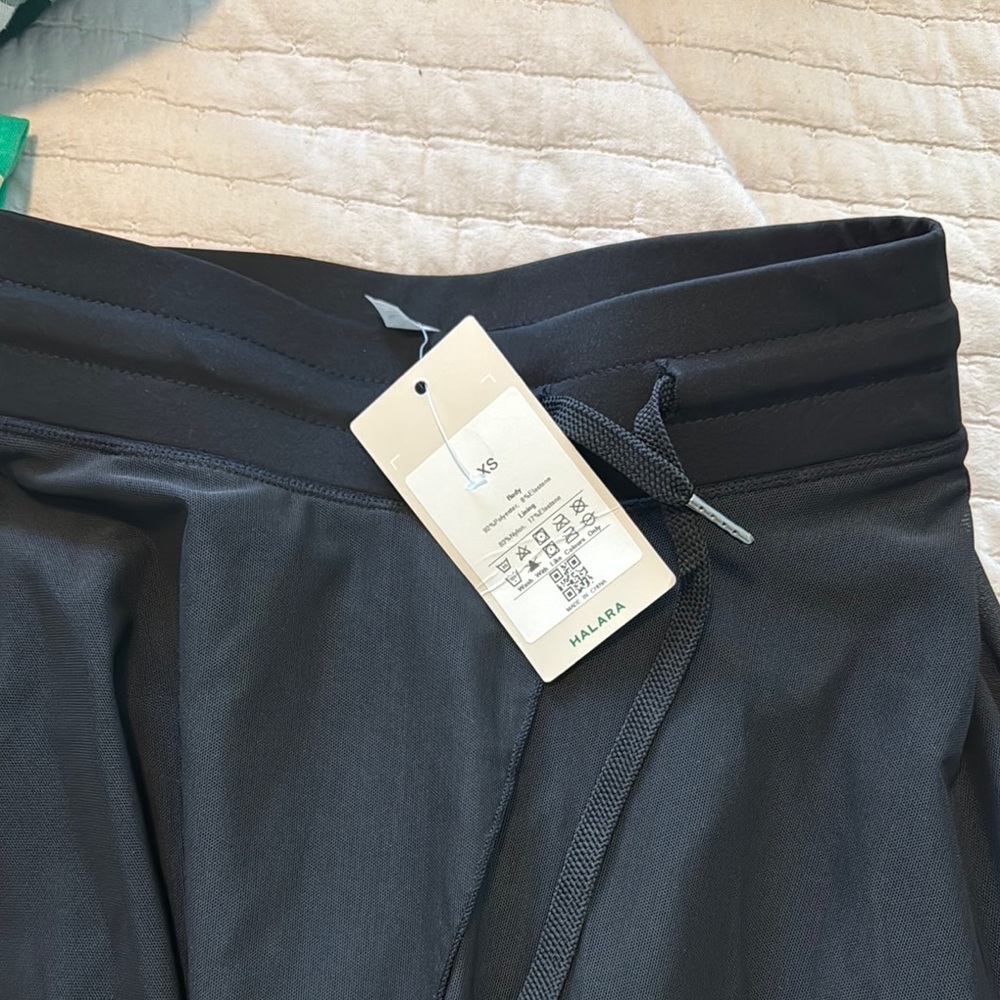 HALARA Black Asymmetrical Pleated Midi Skirt - Picture 8 of 8